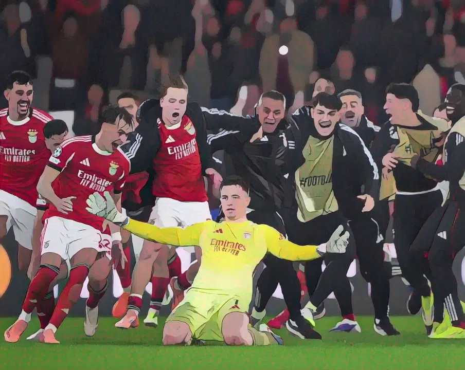 Anatoliy Trubin and the Benfica squad celebrate his 98th-minute header